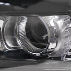 Halogen projector headlight adjuster close-up for 2013-2016 Ford Fusion