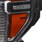 Left LED headlight lens close-up for 2020-2023 GMC Sierra HD