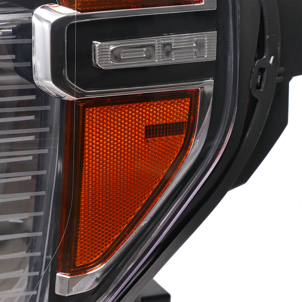 Left LED headlight lens close-up for 2020-2023 GMC Sierra HD