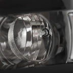 Halogen headlight mounting tab close-up for 2015-2019 Chevy Silverado HD