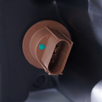 Halogen projector headlight bulb socket close-up for 2010-2012 Ford Taurus