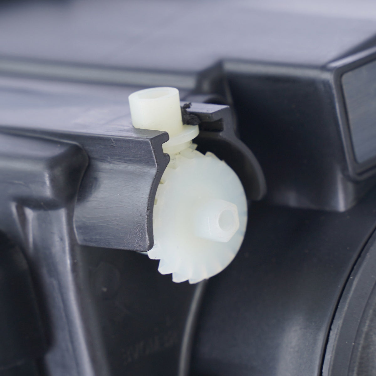Halogen projector headlight connector close-up for 2014-2020 Chevy Impala