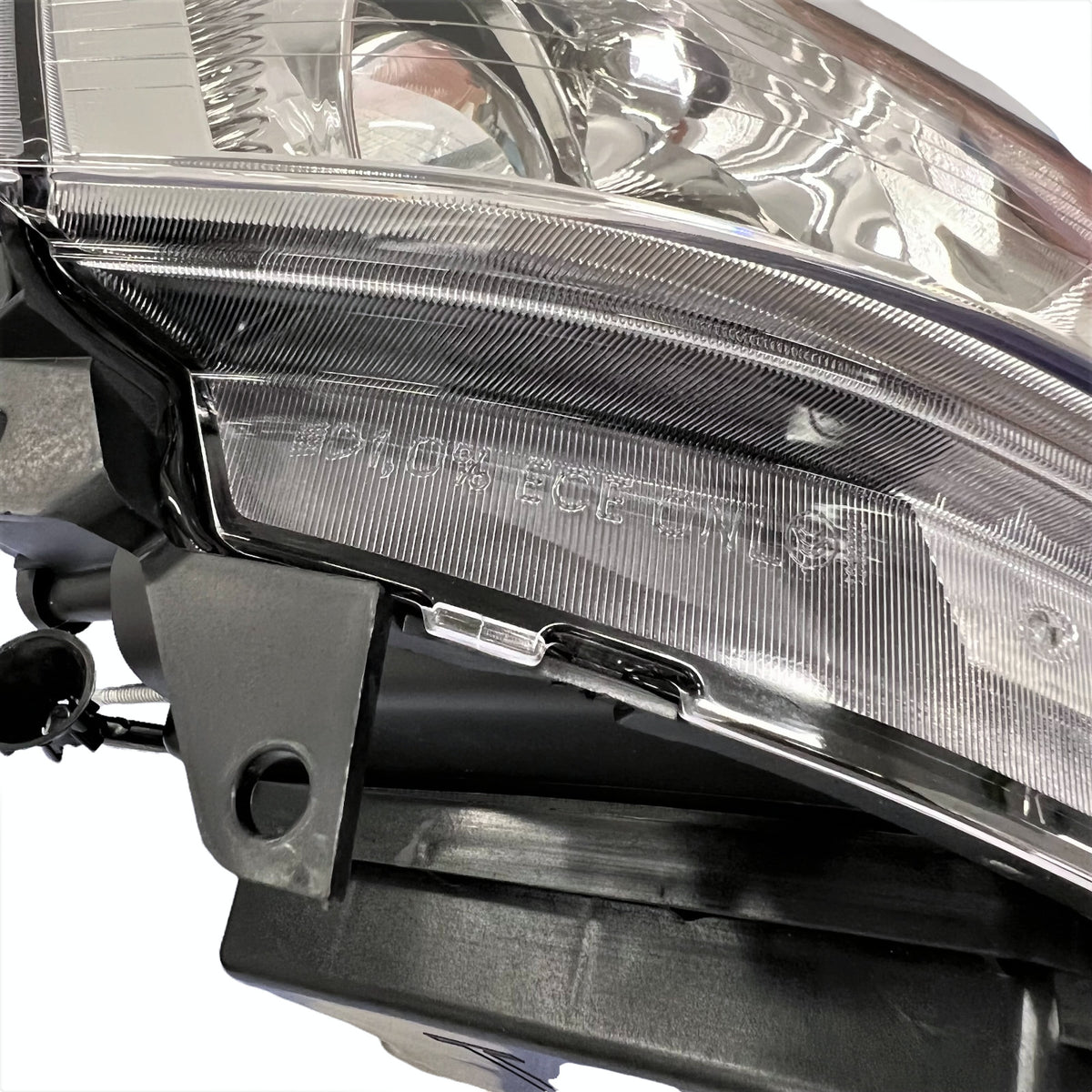 Halogen headlight bulb socket close-up for 2005-2011 Cadillac STS