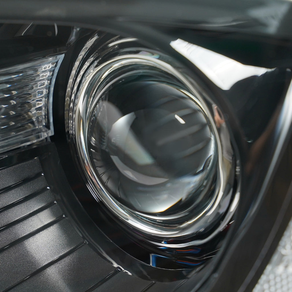 Right halogen projector headlight lens close-up for 2015-2023 Chrysler 300
