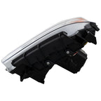 Left halogen projector headlight lens close-up for 2014-2015 GMC Sierra 1500