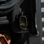 Halogen headlight bulb socket close-up for 2023-2026 Ford Super Duty