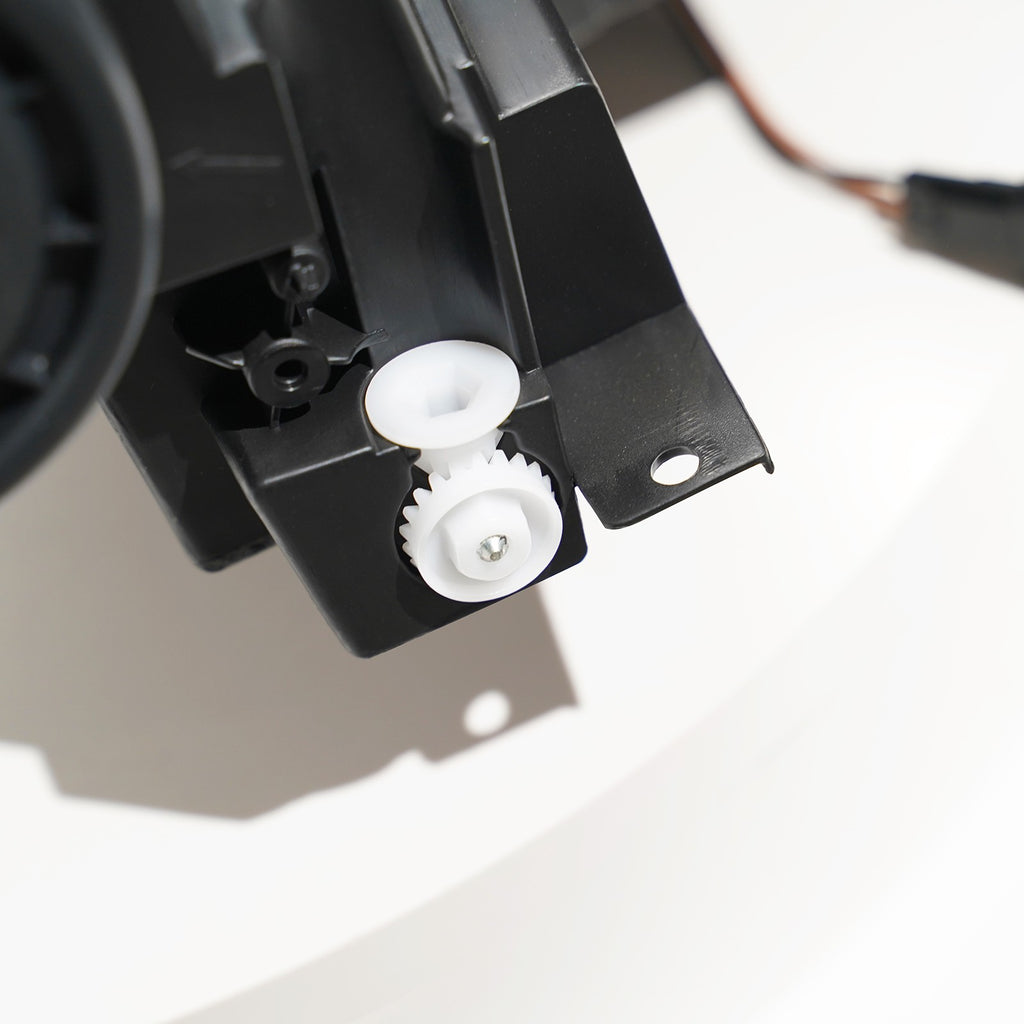 Halogen projector headlight adjuster close-up for 2017-2021 Jeep Compass