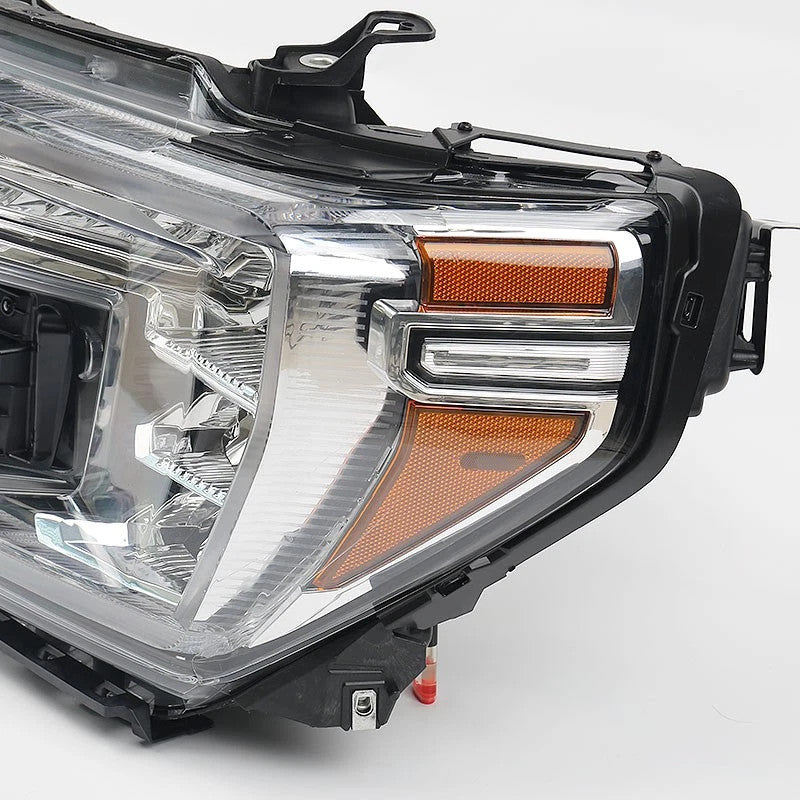 Left LED headlight lens close-up for 2019-2021 GMC Sierra 1500