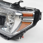 Left LED headlight lens close-up for 2019-2021 GMC Sierra 1500