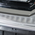Halogen projector headlight connector close-up for 2015-2019 GMC Sierra HD