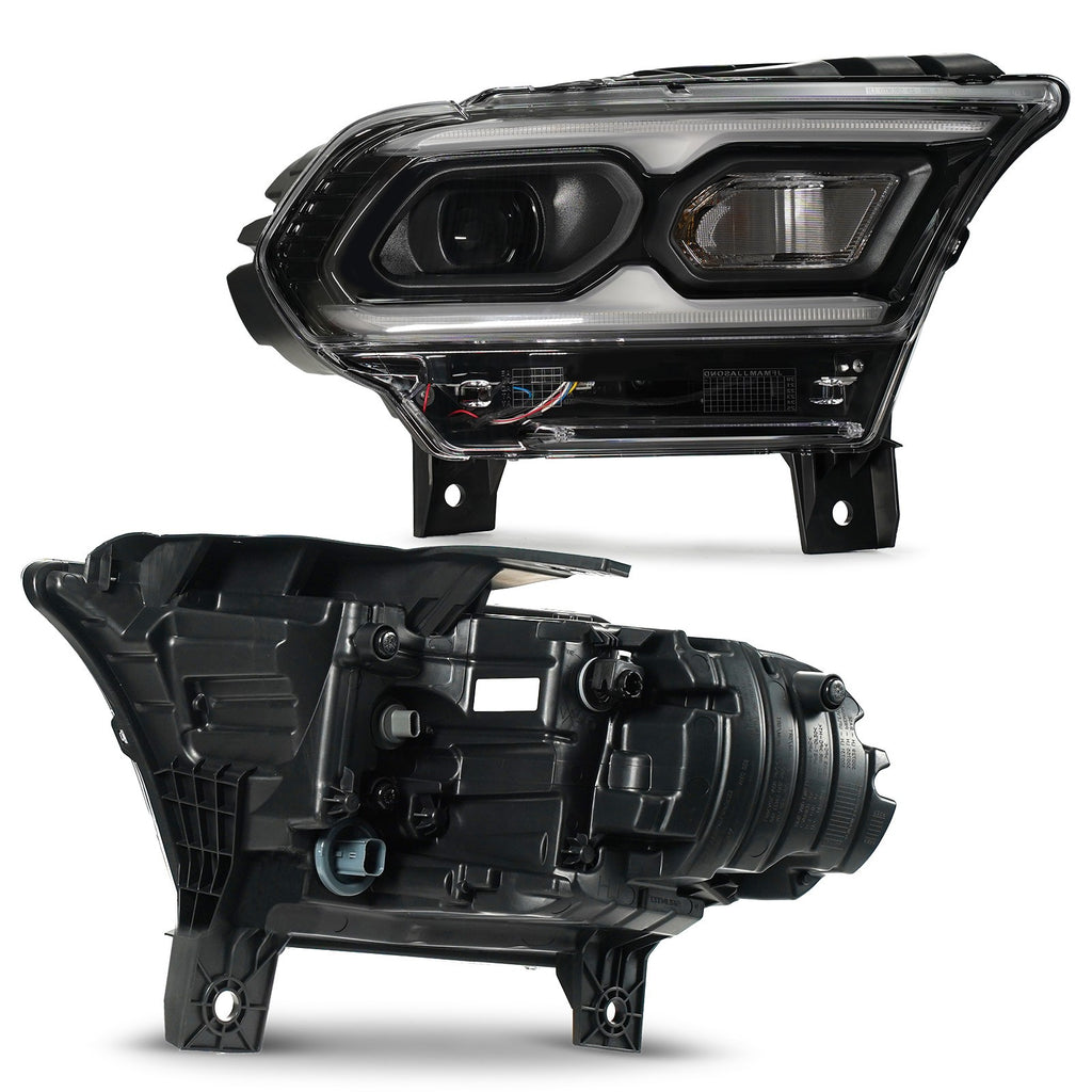 Left LED projector headlight lens close-up for 2021-2026 Dodge Durango