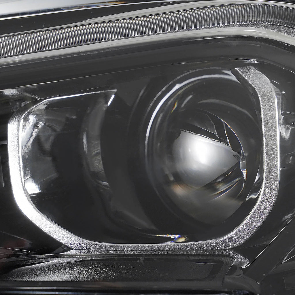 Left HID headlight lens close-up for 2018-2021 GMC Terrain
