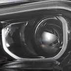 Left HID headlight lens close-up for 2018-2021 GMC Terrain