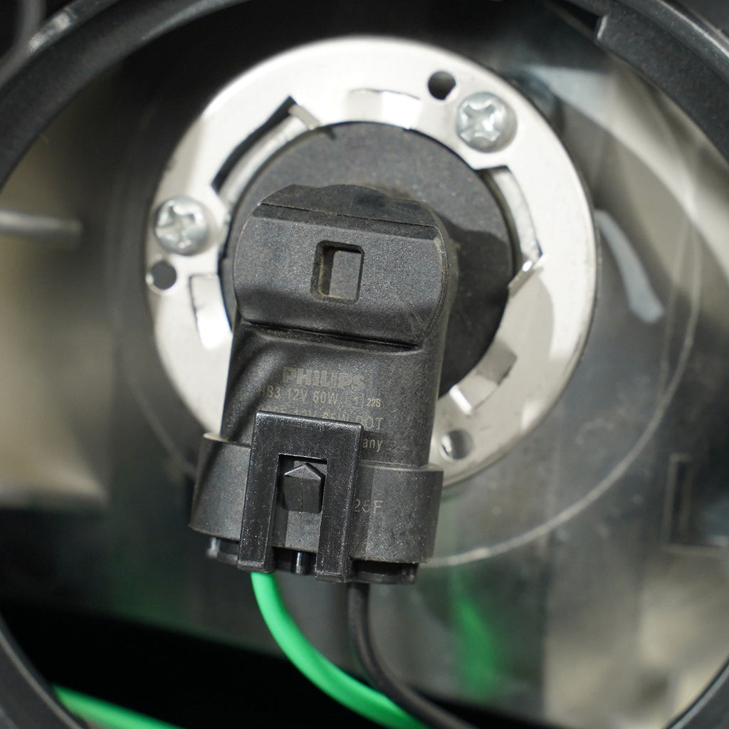 Halogen headlight mounting tab close-up for 2016-2017 Chevy Equinox