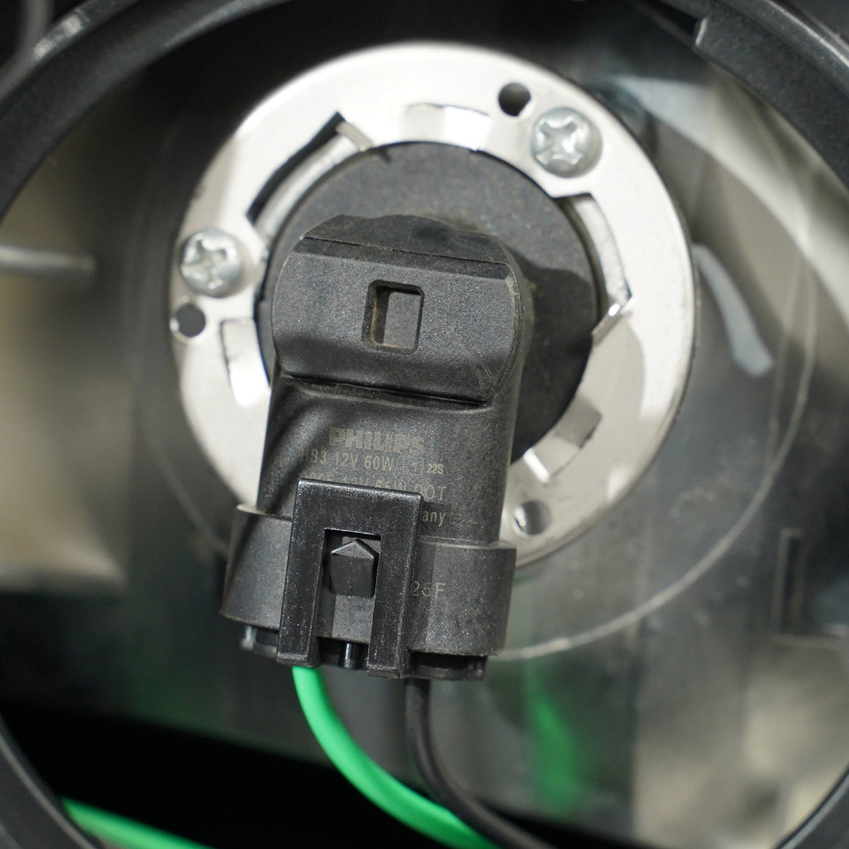 Halogen headlight mounting tab close-up for 2016-2017 Chevy Equinox
