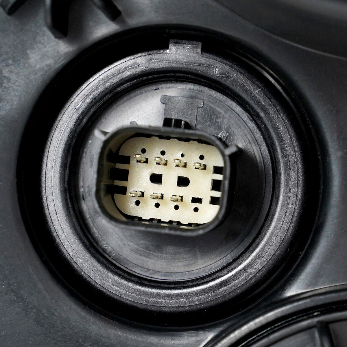 Hid headlight mounting tab close-up for 2015-2020 Chevy Tahoe/Suburban