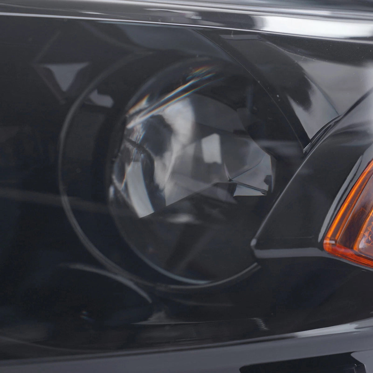 Halogen headlight mounting tab close-up for 2019-2025 Chevy Malibu