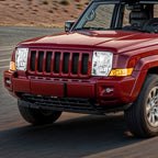 Passenger side Chrome Halogen headlight close-up for 2006-2010 Jeep Commander