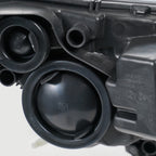 Halogen headlight bulb socket close-up for 2014-2018 Ford Transit Connect