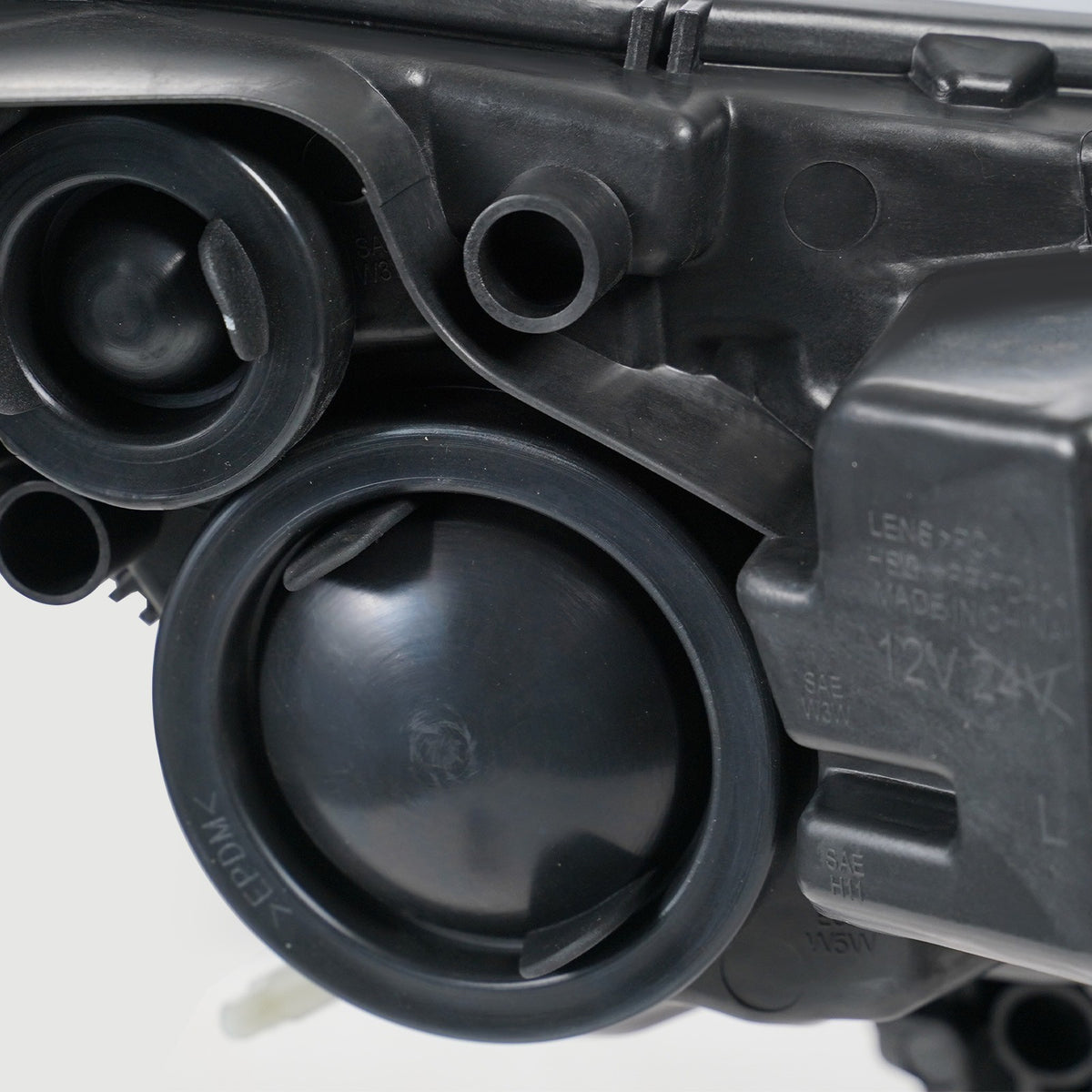 Halogen headlight bulb socket close-up for 2014-2018 Ford Transit Connect