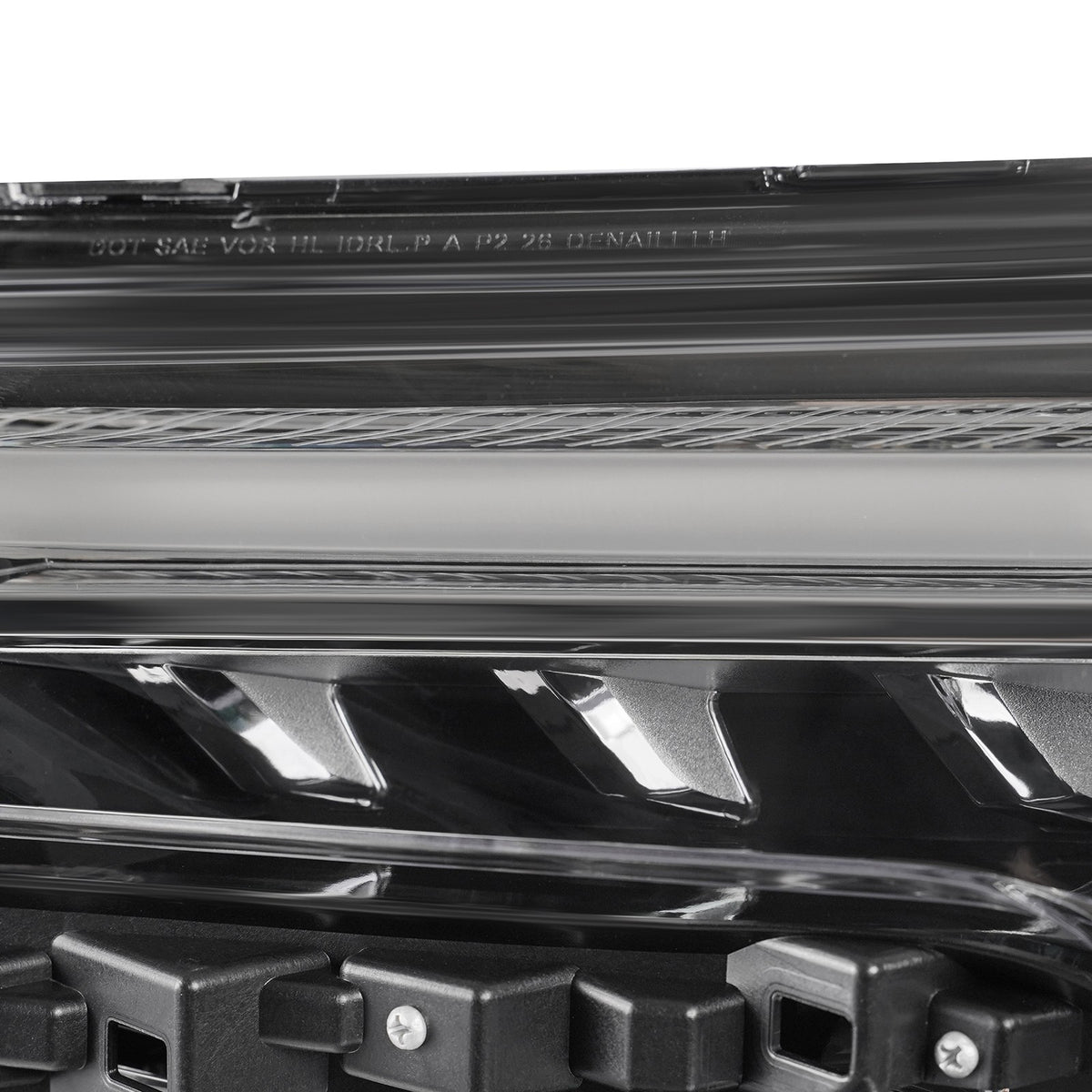 Led headlight mounting tab close-up for 2023-2026 GMC Canyon