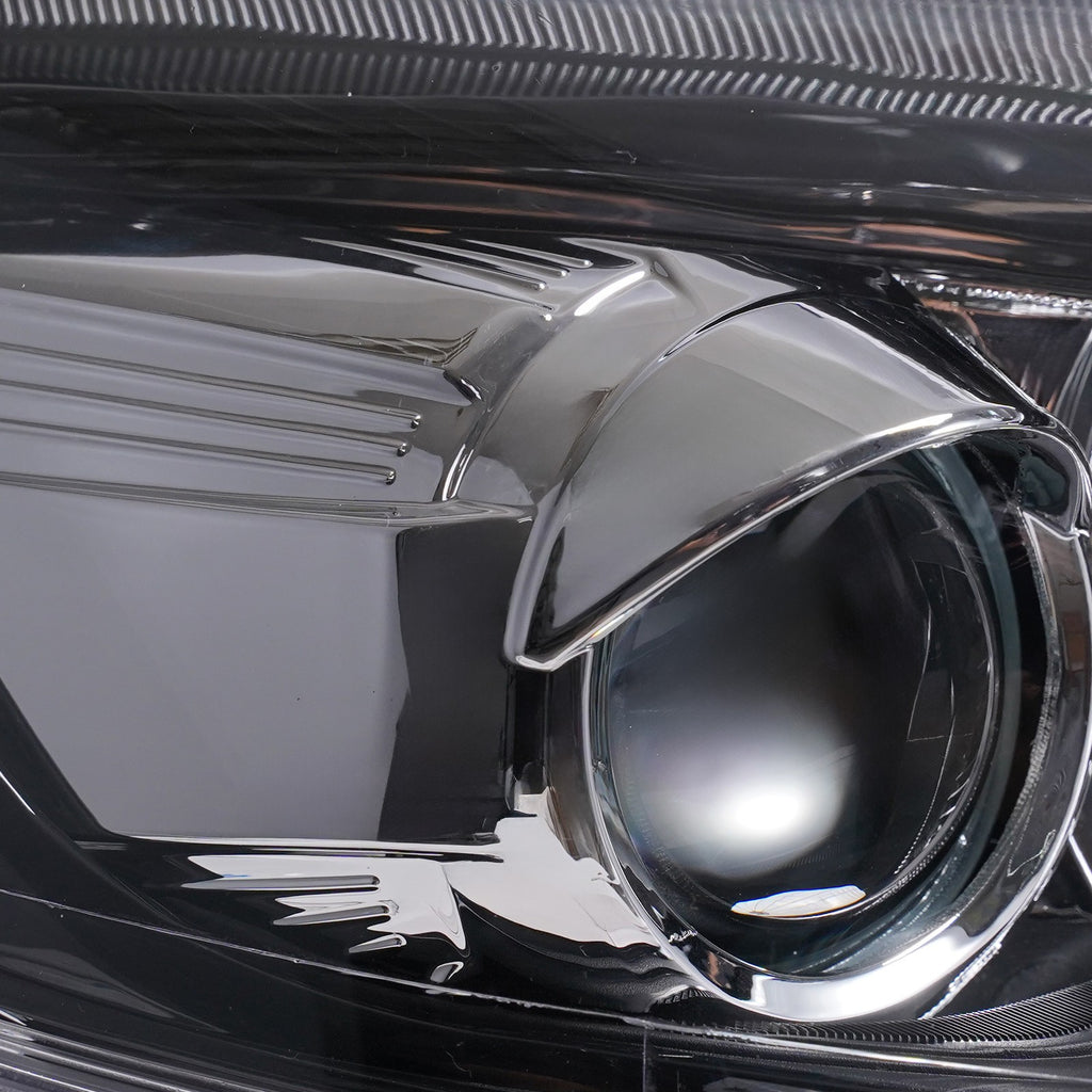 Halogen projector headlight mounting tab close-up for 2012-2014 Ford Focus