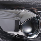 Halogen projector headlight mounting tab close-up for 2012-2014 Ford Focus