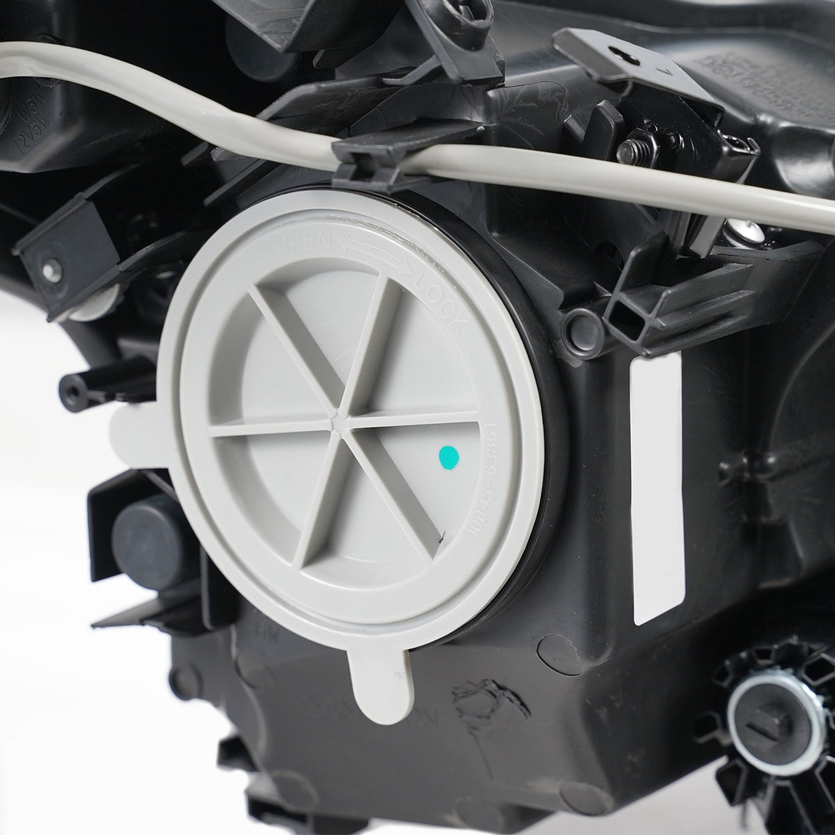 Hid headlight adjuster close-up for 2011-2014 Infiniti M37/M56/Q70
