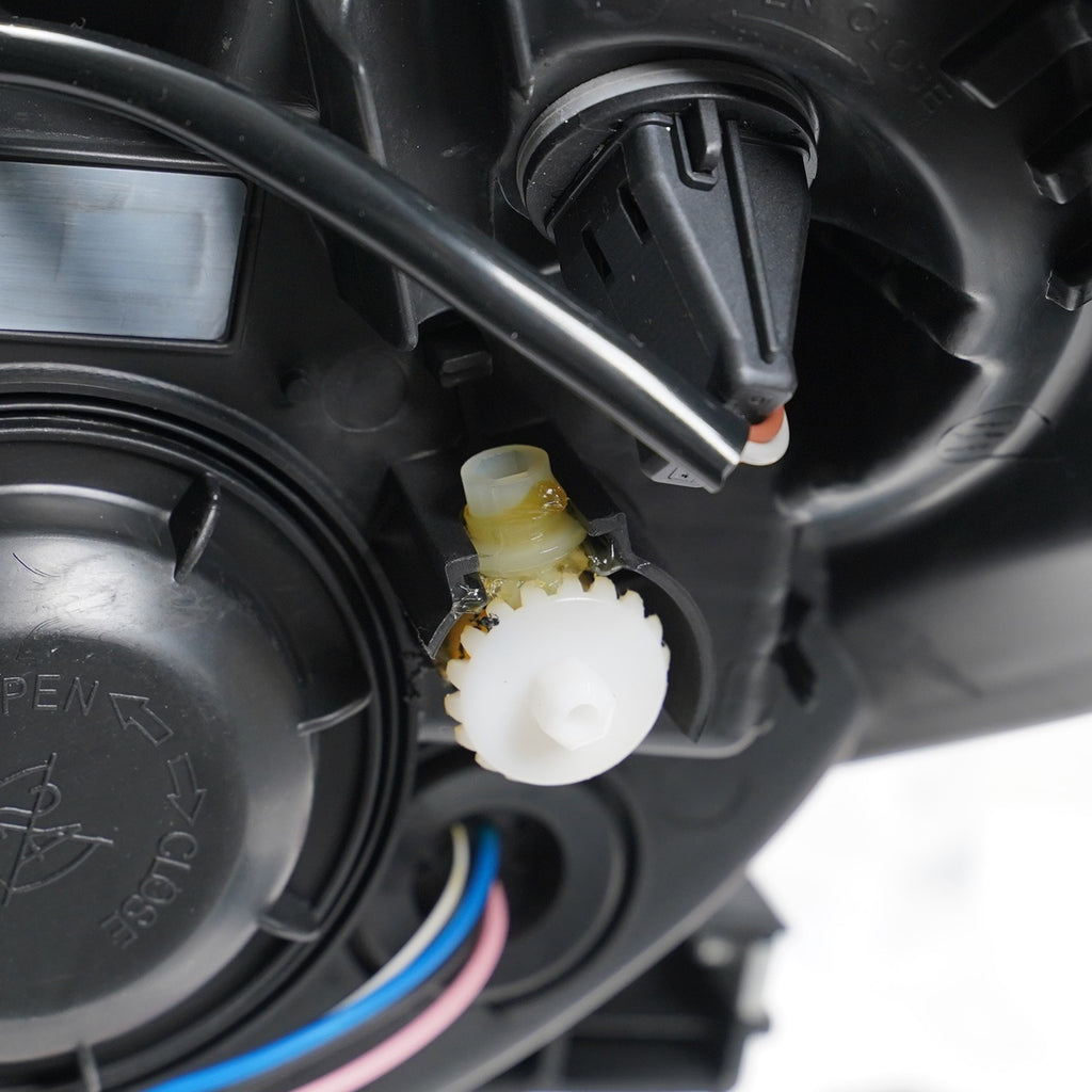 Halogen headlight bulb socket close-up for 2013-2016 Buick Encore