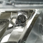 Halogen headlight mounting tab close-up for 2010-2012 Ford Fusion