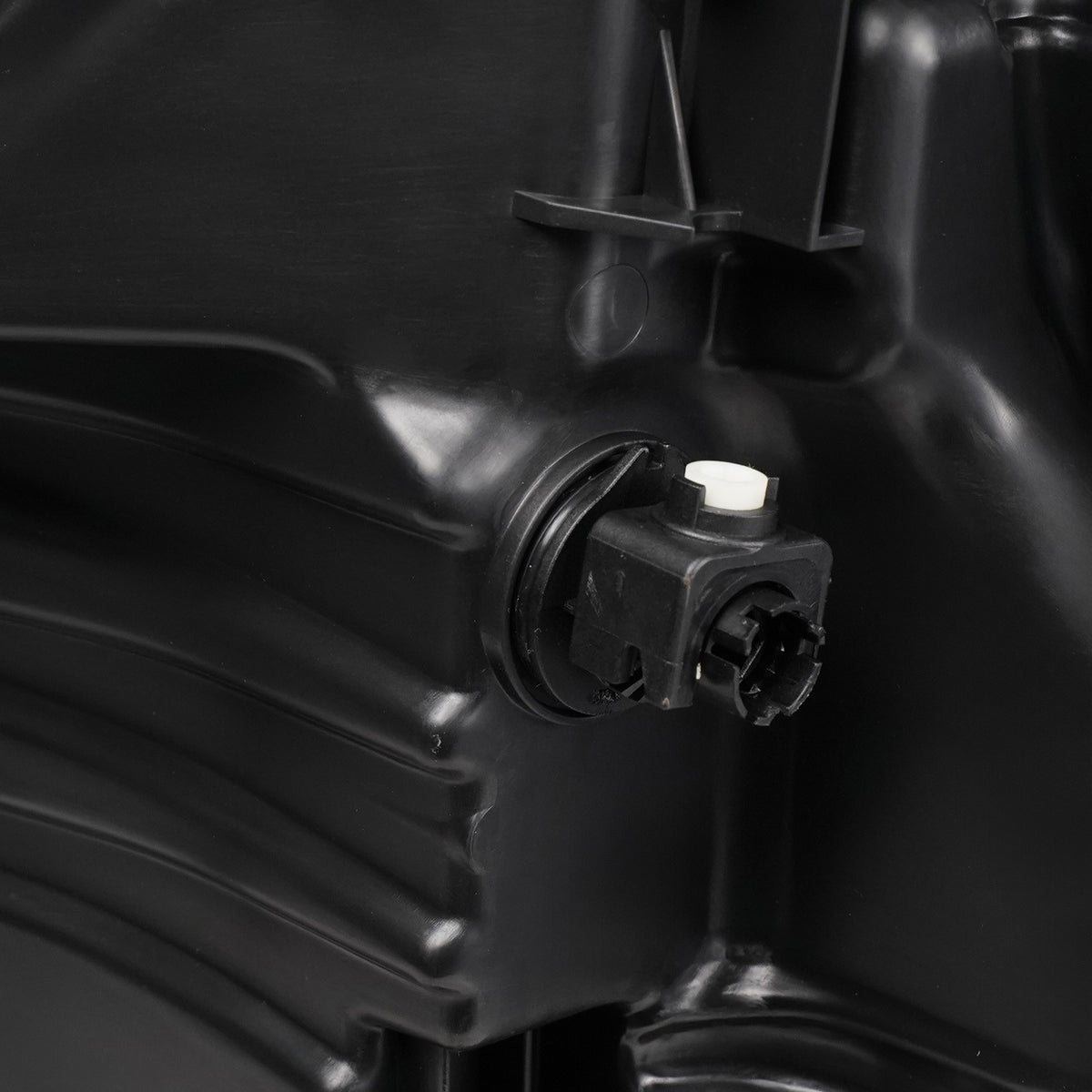 Led headlight mounting tab close-up for 2021-2023 Ford F-150