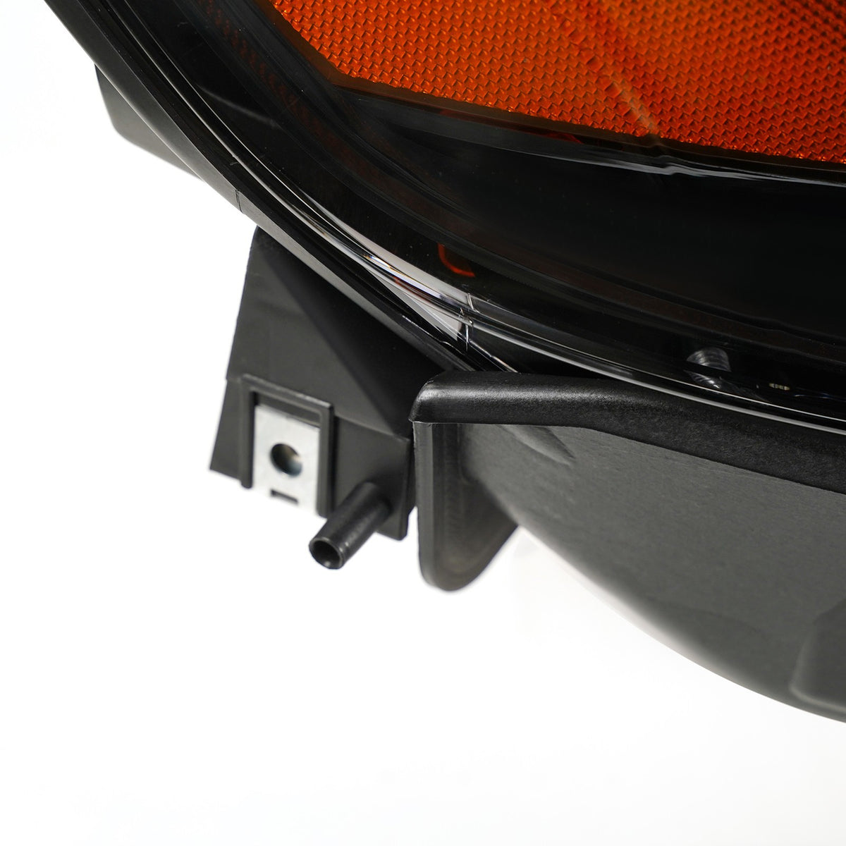 Led headlight mounting tab close-up for 2013-2019 Ford Taurus