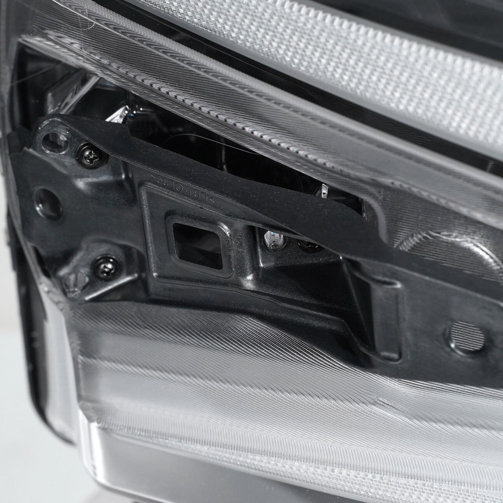 Led headlight mounting tab close-up for 2022-2026 Chevrolet Silverado 1500