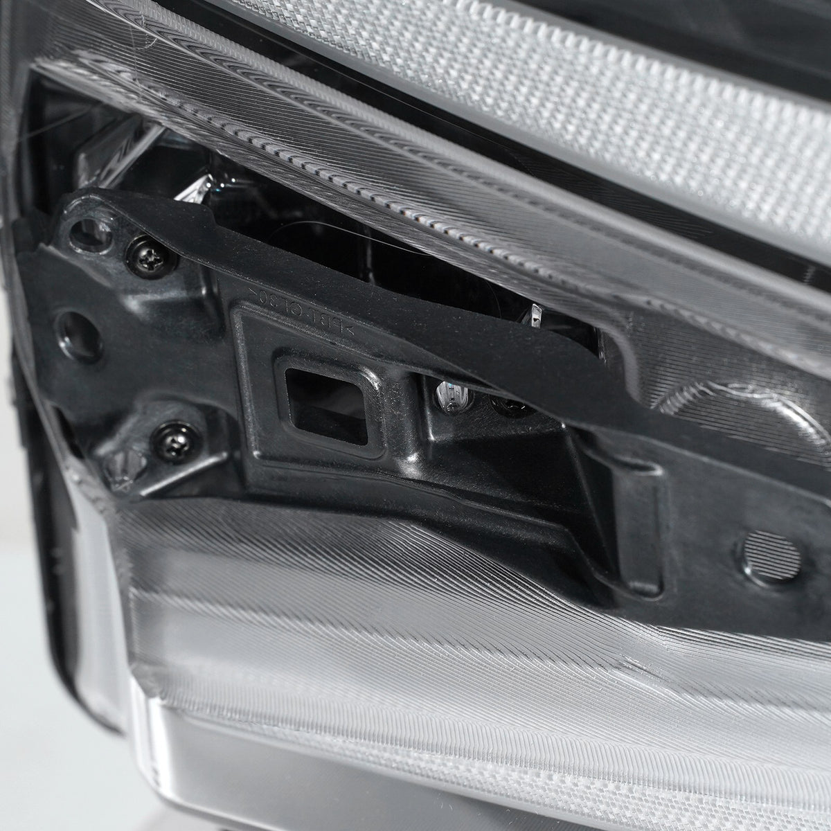 Led headlight mounting tab close-up for 2022-2026 Chevrolet Silverado 1500