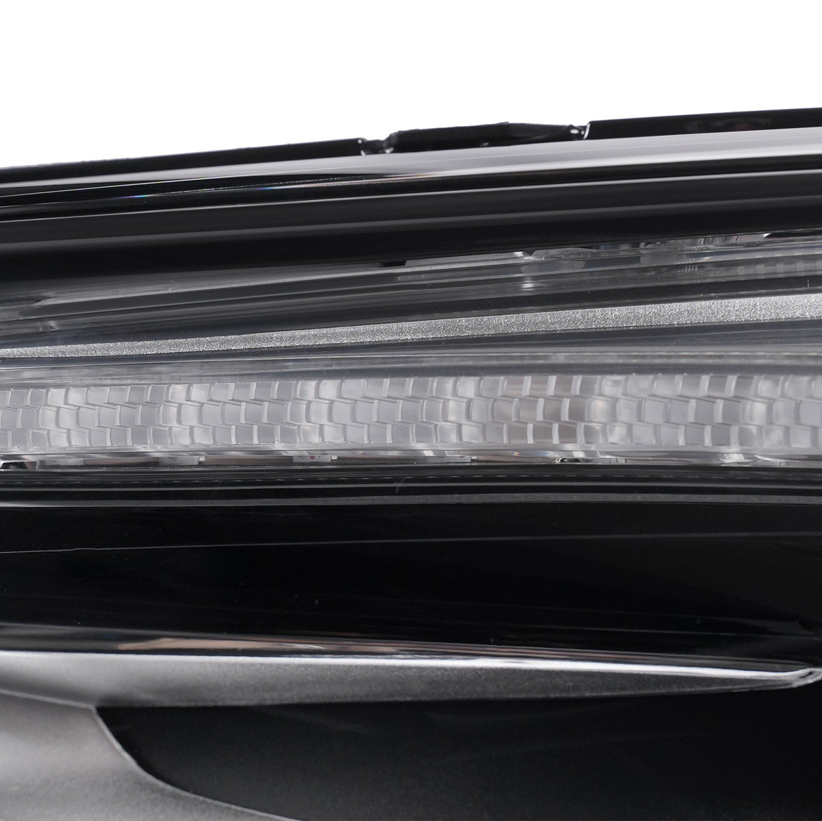 Led headlight mounting tab close-up for 2018-2021 Buick Enclave