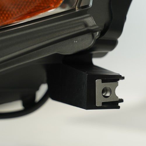 Hid headlight mounting tab close-up for 2010-2012 Lexus RX350