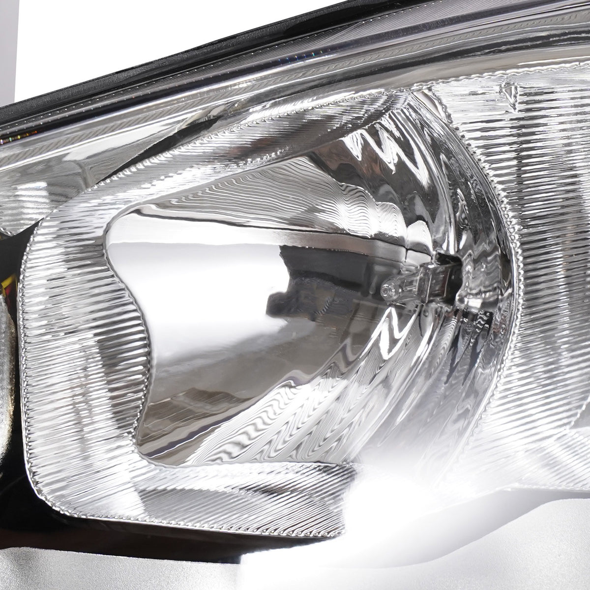 Halogen headlight mounting tab close-up for 2014-2018 Ford Fiesta