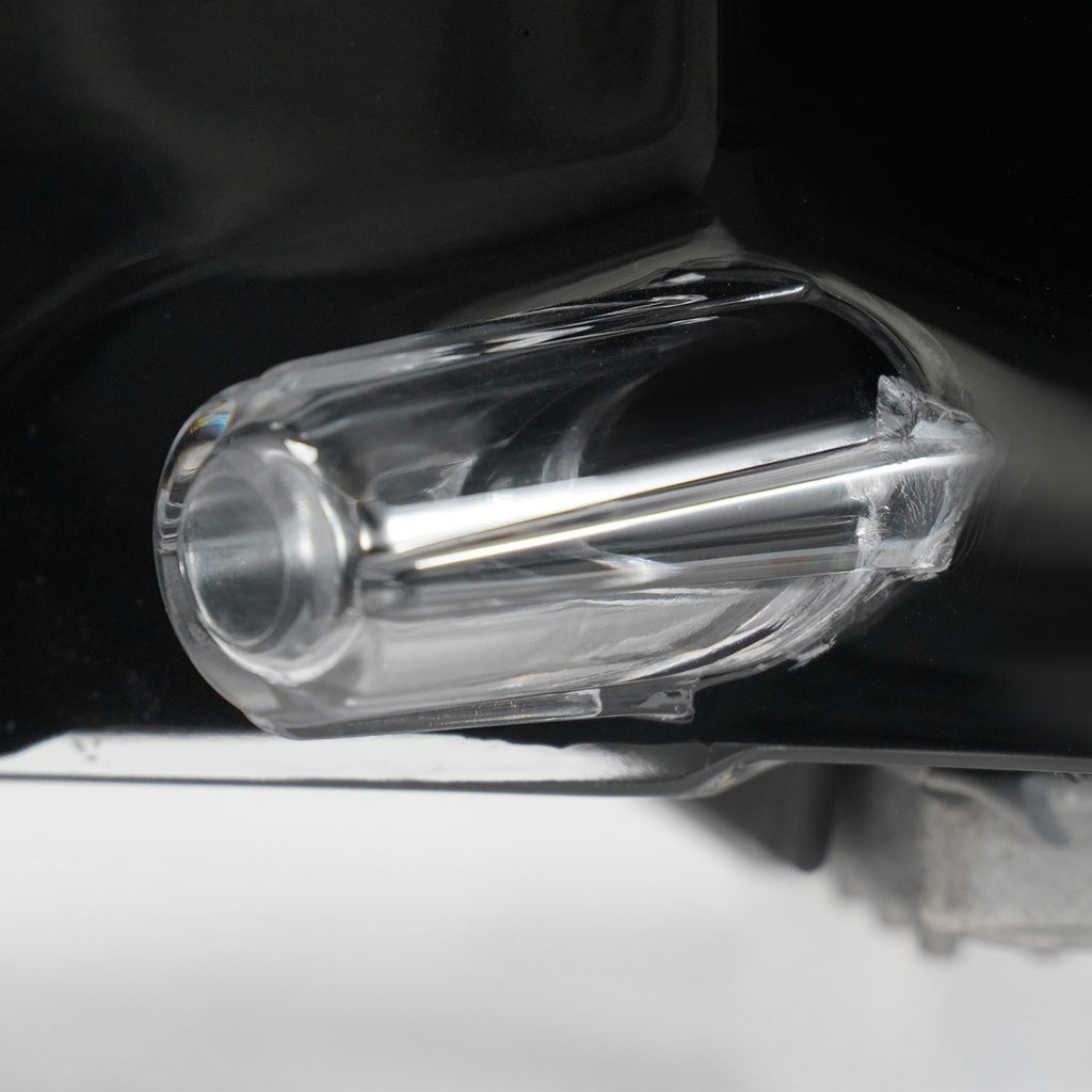 Hid headlight mounting tab close-up for 2014-2016 Jeep Grand Cherokee