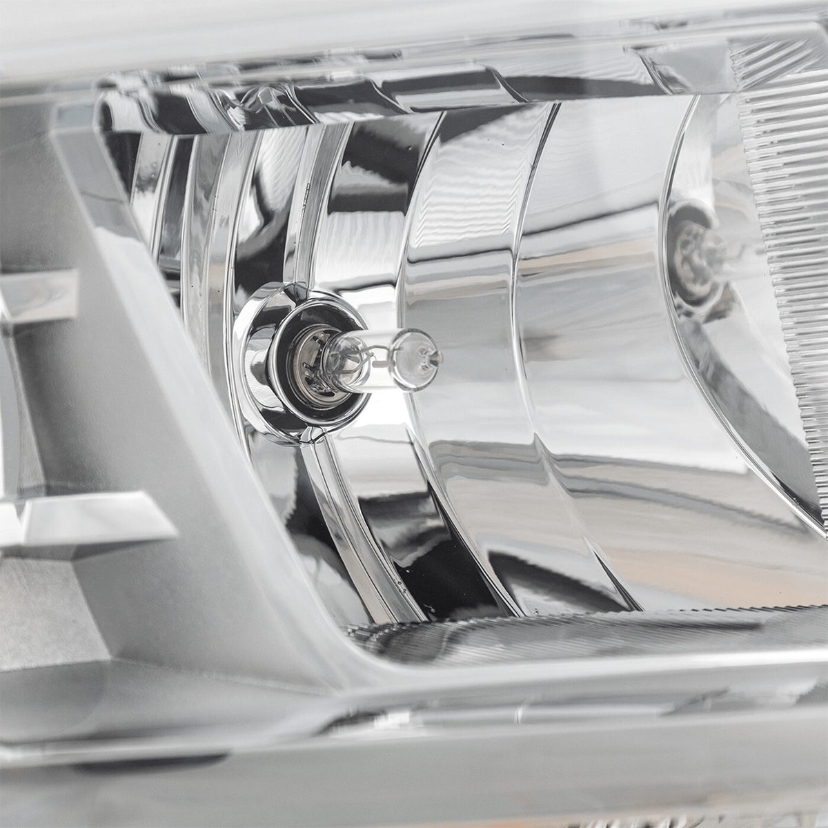 Halogen projector headlight mounting tab close-up for 2015-2017 Ford Expedition