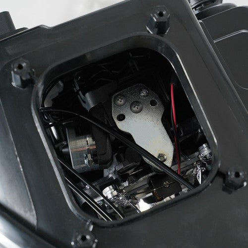 Hid headlight mounting tab close-up for 2010-2019 Lincoln MKT