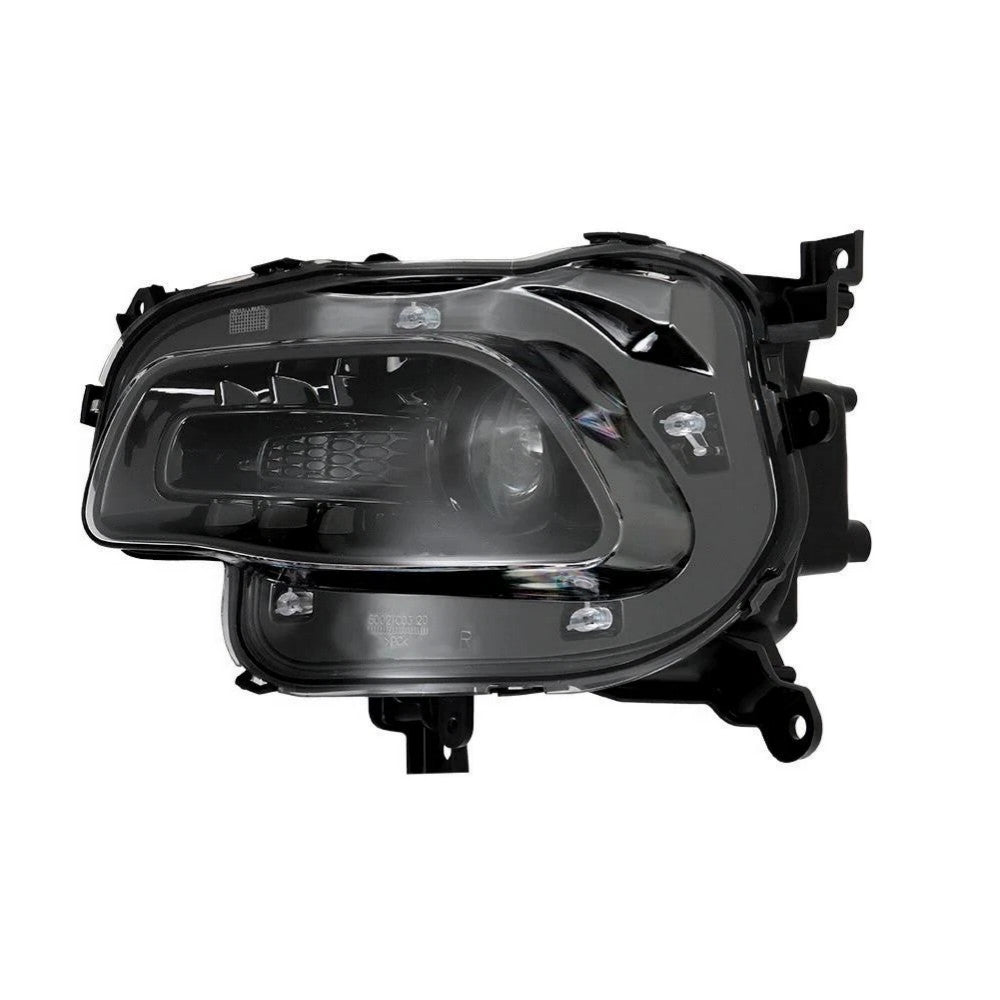 Right HID headlight lens close-up for 2014-2018 Jeep Cherokee