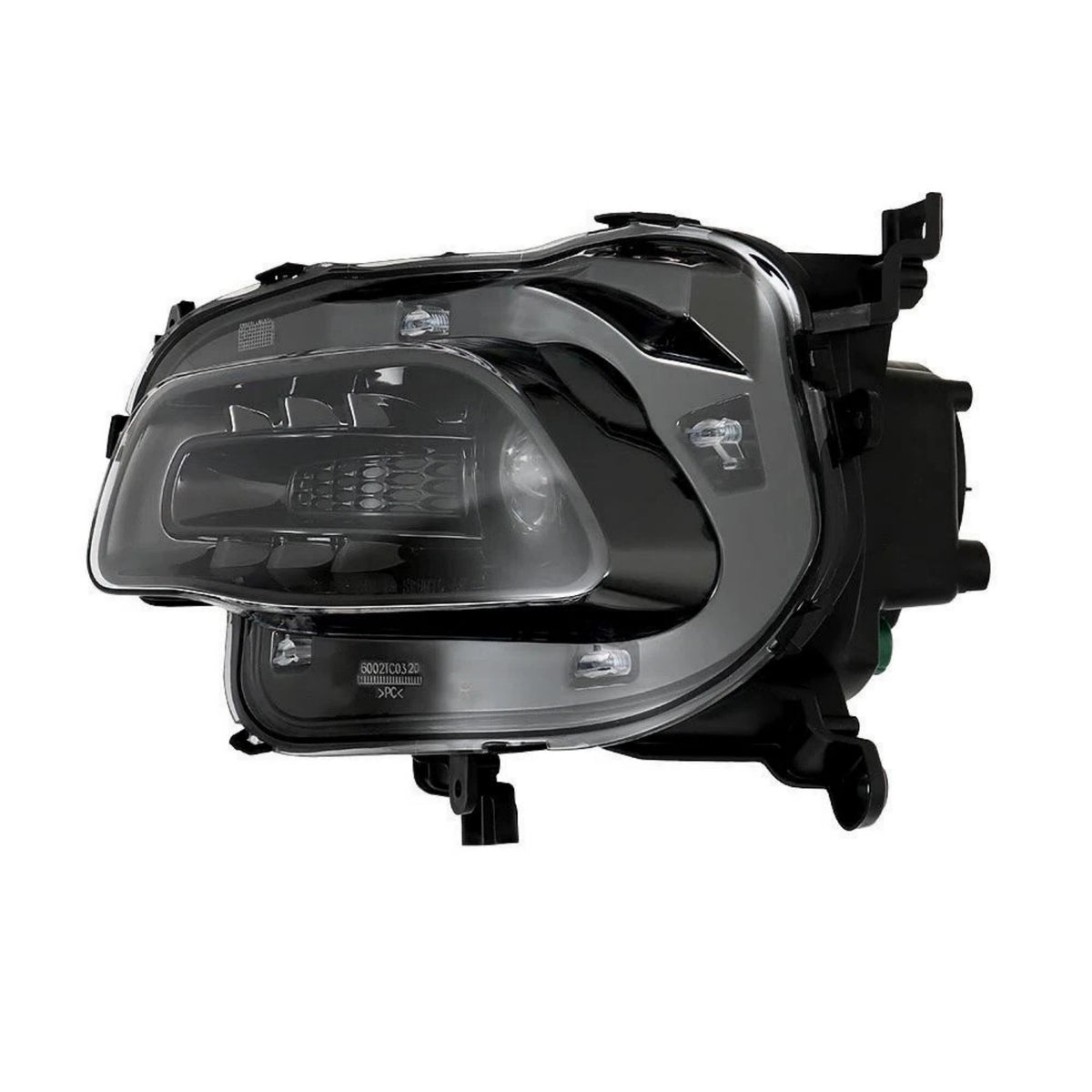 Right HID headlight lens close-up for 2014-2018 Jeep Cherokee