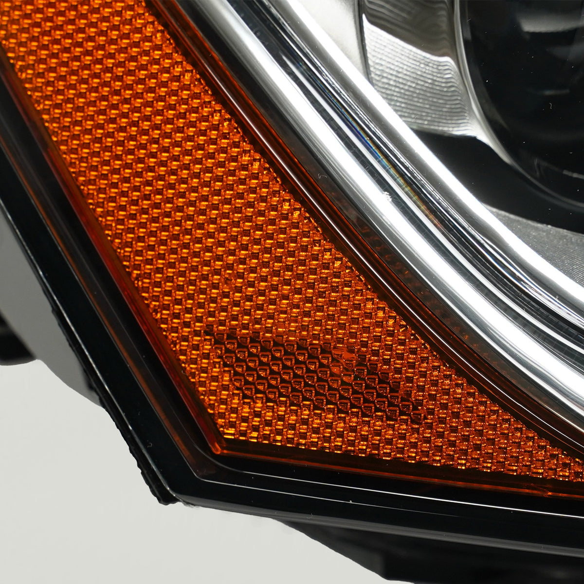 Hid headlight mounting tab close-up for 2013-2017 Audi Q5
