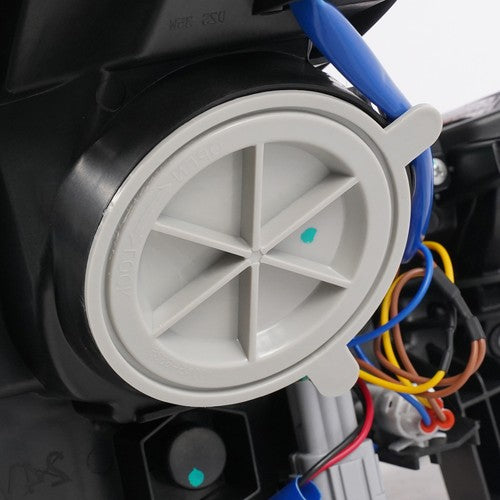 Hid headlight mounting tab close-up for 2009-2020 Nissan 370Z
