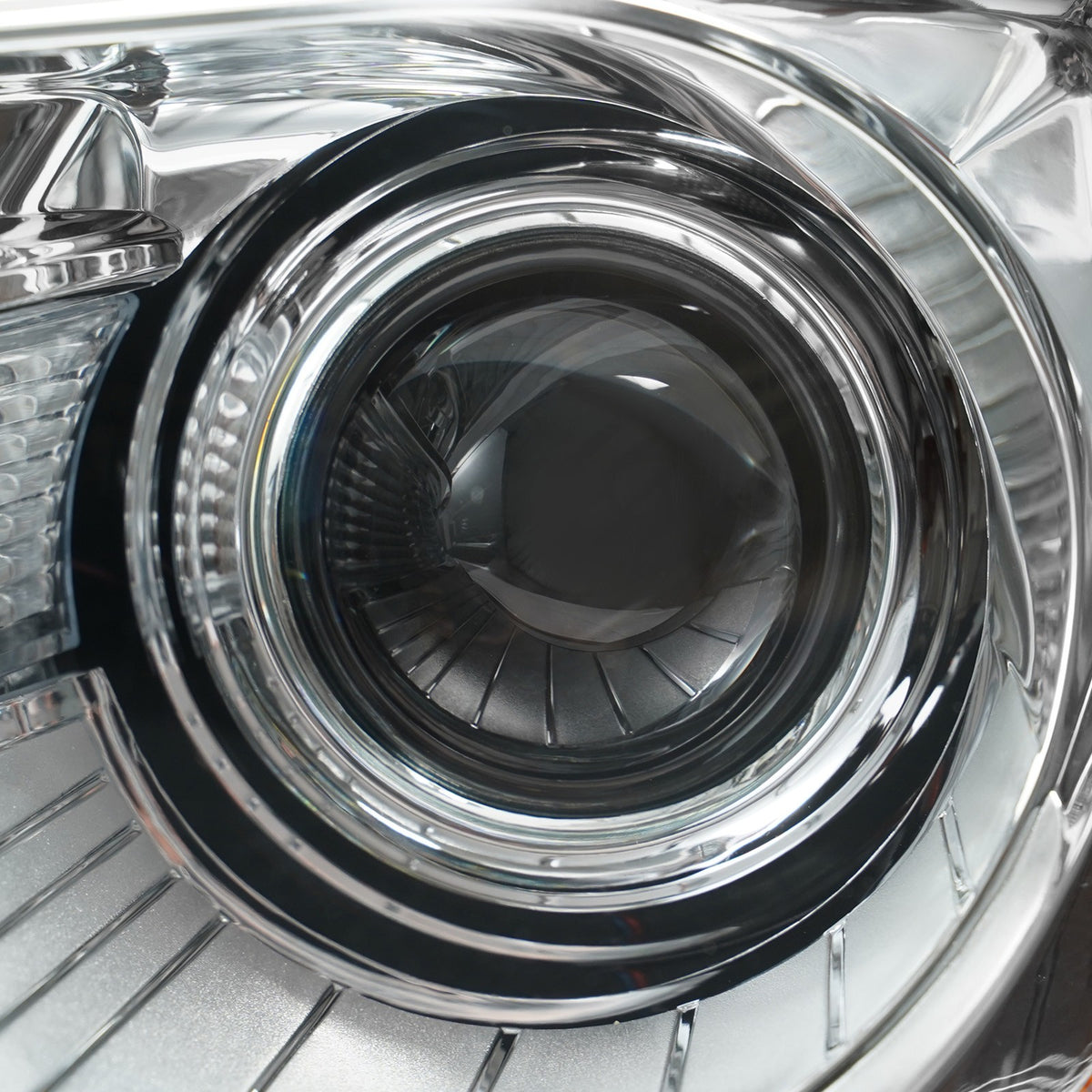 Passenger side Chrome HID Projector headlight close-up for 2011-2014 Chrysler 300 (view 11)