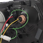 Projector headlight mounting tab close-up for 2010-2014 Ford Mustang