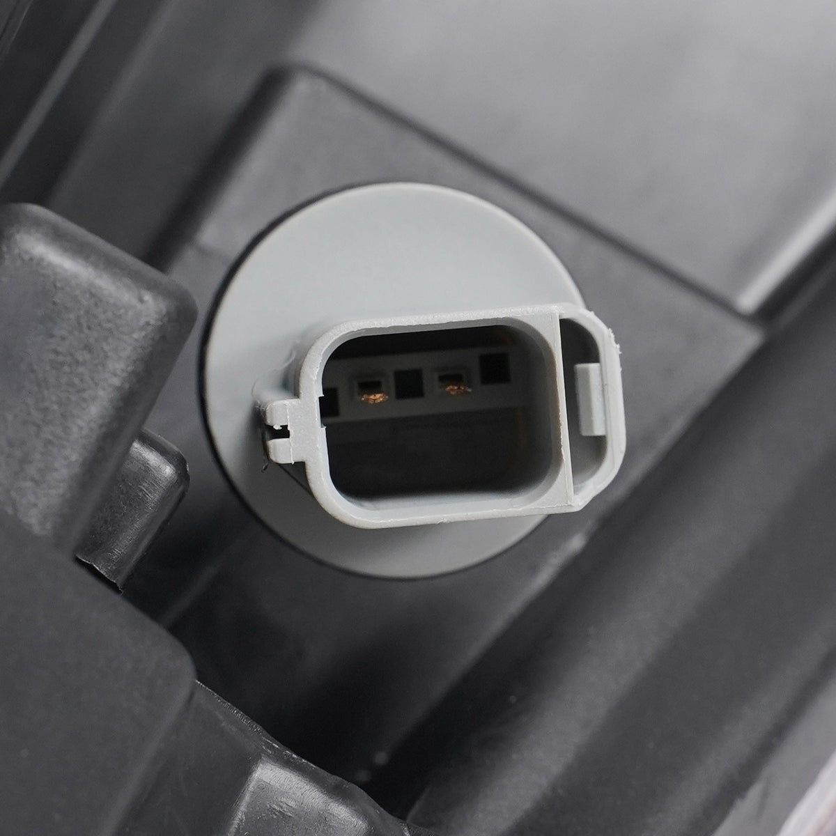Halogen headlight DOT marking close-up for 2013-2016 Ford Escape