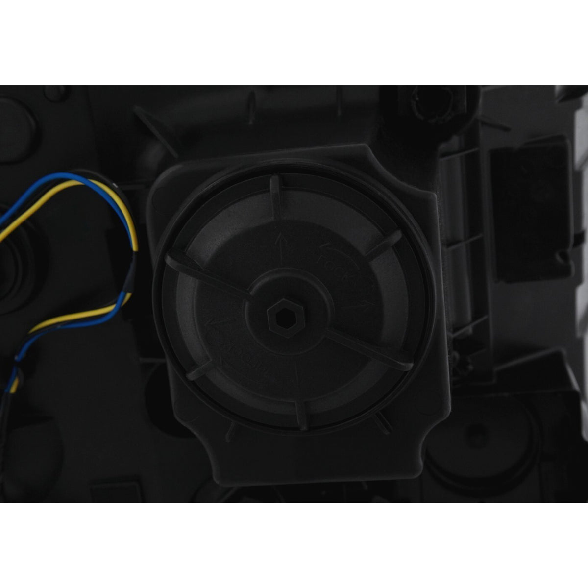 Halogen projector headlight mounting tab close-up for 2014-2015 GMC Sierra 1500