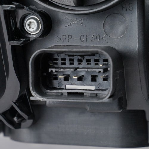 Halogen headlight DOT marking close-up for 2009-2012 BMW 3 Series E90