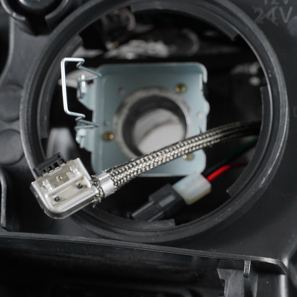 Hid headlight DOT marking close-up for 2014-2016 Jeep Grand Cherokee